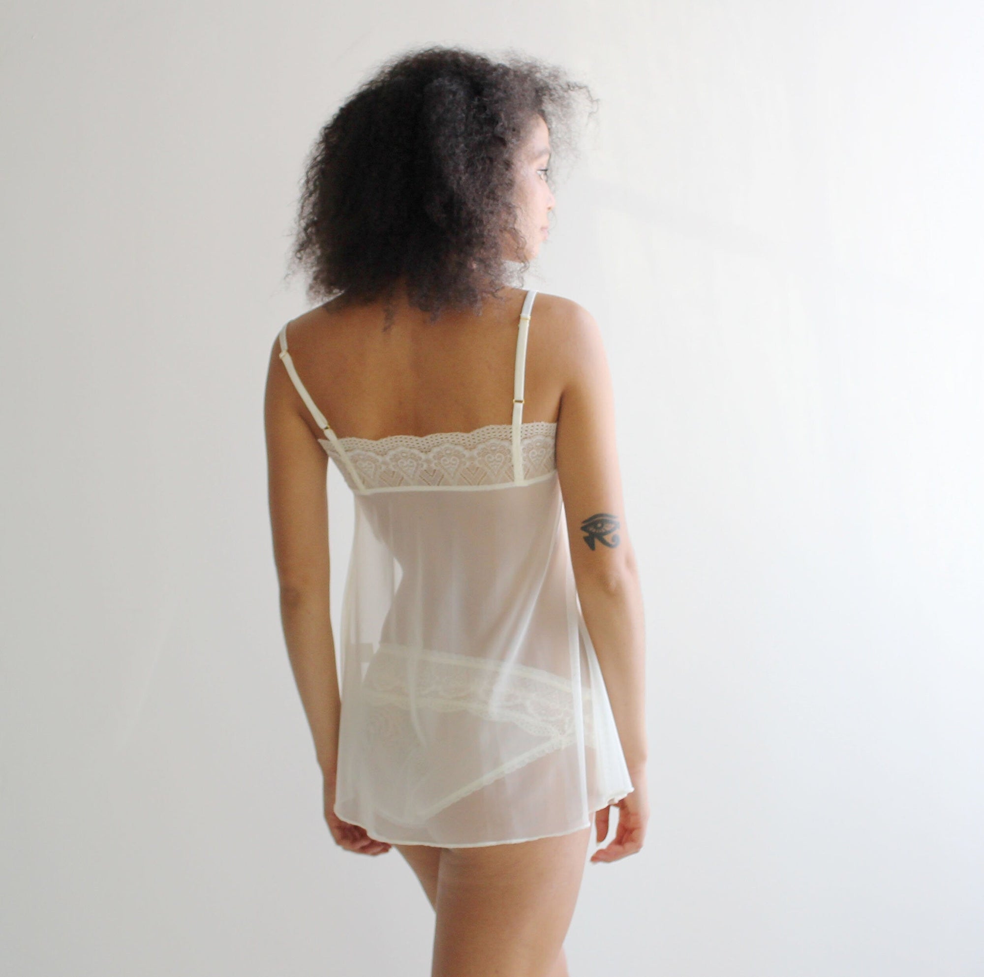 Sheer Lingerie Set includes lace trim babydoll camisole and panties